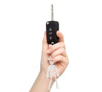 DEARMAMY 10 Pcs Glow in The Dark Skull Keychains Pvc Pendant Creative Skull Hanging Key Ring Fashion Key Holder for Bags Halloween Accessory Set