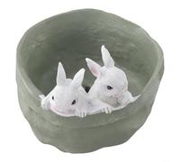 Decorative bunny flower pot for gardens and interiors, designed to hold multiple plant types and add charm to farmhouse style settings