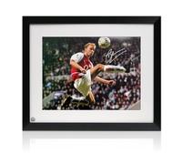 Dennis Bergkamp Signed Arsenal Football Photo: The Statue. Framed