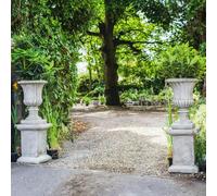 DGS Statues Pair of Large Stone Cast Flute Urns and Classic Plinths