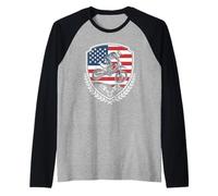 Dirt Bike Rider Soaring Over the Patriotic American Flag Raglan Baseball Tee