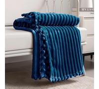DISSA Fleece Blanket: Soft, Voluminous, Fluffy, Warm, Cozy, Perfect Throw for Couch, Bed, Sofa, with Pom-Poms at the Hem, Flannel Blanket, Throw with a Size of approx. 130 x 160 cm, Blue