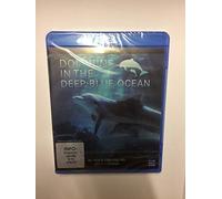 Dolphins In The Deep Blue Ocean