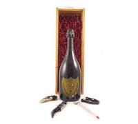 Dom Perignon Vintage Champagne 1999 in a silk lined wooden box with four wine accessories, 1 x 750ml