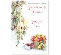 doodlecards Grandson and Fiancee Christmas Card Lamp and Parcels Medium Size Christmas Card for Grandson & Fiancee with Plain Envelope