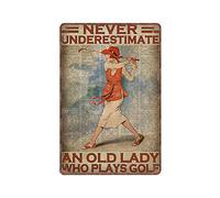 Dreacoss Never Underestimate An Old Lady Who Plays Golf Tin Signs, Woman Golf Gift, Golf Art, Funny Metal Sign Vintage Wall Art for Kitchen Garden Bathroom Farm Home Decor Tin Sign, 20x30 cm
