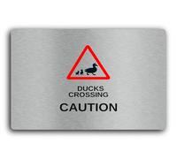 Duck crossing caution sign, indicating the presence of ducks crossing a road or path. Sign - 9.5x9.5cm Brushed Aluminium