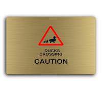 Duck crossing caution sign, indicating the presence of ducks crossing a road or path. Sign - 9.5x9.5cm Brushed Aluminium