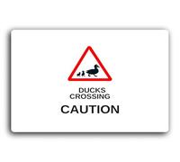 Duck crossing caution sign, indicating the presence of ducks crossing a road or path. Sign - 9.5x9.5cm Brushed Aluminium