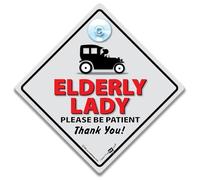 Elderly Lady Driving Car Sign Joke car sign for elderly drivers. Suction cup elderly driver sign for senior drivers. A baby on board sign for old lady drivers - 14 cm x 14cm x 2cm