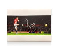 Exclusive Memorabilia Paul Scholes Signed Manchester United Football Photo: Strike