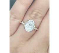 Faith Diamonds 18ct Yellow Gold with Platinum Head 2.90ct Total D/E Colour Oval Cut Solitaire with Hidden Halo & Fancy Round Brilliant Cut Shoulde