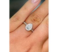 Faith Diamonds Platinum 0.66ct Total Pear Cut Diamond Centre with Halo & Diamonds Shoulders Ring