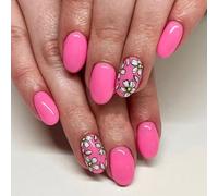 False gloss natural cover in the shape of almonds pressing nails. Acrylic glue false nail stick