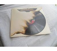 FEEL THE HEAT LP (VINYL) US ATLANTIC 1980