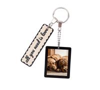 Fisura Original metal keyring with photo frame and message "all you need is love". Women's keyring black and beige. Original photo frame. Gift for women Mother's Day or birthday.