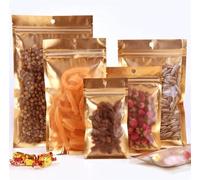 flat lock bags 100Pcs Gold Mylar Zip Lock Bags Aluminum Foil Bags Durable Metallic Foil Mylar Flat Zipper Bag for Candy and Food Packaging Resealable Pouches(14x20cm)