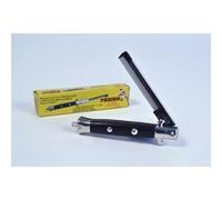 Flick Comb Press the Button and Out Flicks The Comb Also Has A Safety Switch