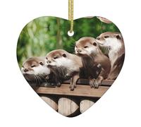 Four cute otters Christmas heart-shaped ceramic pendant with a printed pattern 2.9 inches in diameter