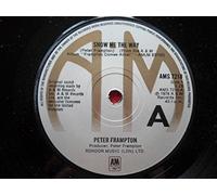 Frampton, Peter - Frampton, Peter Show Me The Way 7" A&M AMS7218 EX 1976 there is handwritten number on label and 2mm drill hole in label rim