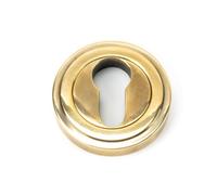 From The Anvil Aged Brass Round Euro Escutcheon (Art Deco)