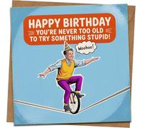 Funny Birthday Card for Him or Her - You're Never Too Old to Try Something Stupid - 145mm Square with Kraft Envelope - Humorous Unicycle Tightrope Design - Adult Joke Greeting Card