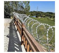 Galvanized Double Spiral Barbed Wire Fence - Durable Security Barrier for Outdoor Protection, Reliable Safety Solution for Gardens, Farms, and Perimeters