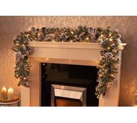 garden mile® Deluxe Large 6ft Luxury Artificial Snow-flocked Tipped Snowy Christmas Garland Extra Thick Pre-Lit Decorated Christmas Garland with 25 Warm White LED Lights Light up Christmas Decoration