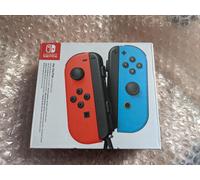 Genuine Nintendo JoyCon Controllers Pair - Neon Red/ Blue Brand New