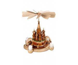 German christmas pyramid arch Saint Basil`s Cathedral, Red Square, Moskow wit...