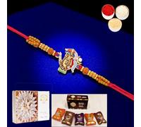 Ghasitaram Gifts Jaiccha Rakhi for Brother Rakhis Online - K-23 Om Krishna Premium Rakhi with Asorted Bites Box and 200 GMS of Kaju katli