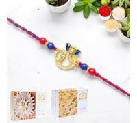 Ghasitaram Gifts Jaiccha Rakhi for Brother Rakhis Online - Om Ganesha Premium Rakhi- K-47 with 200 GMS of Kaju katli and 200 GMS of Soan Papdi