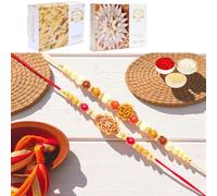 Ghasitaram Gifts Jaiccha Rakhi for Brother Rakhis Online - Set of 2 abc35 and abc105 om rakhis with 200 GMS of Kaju katli and 200 GMS of Soan Papdi