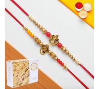 Ghasitaram Gifts Jaiccha Rakhi for Brother Rakhis Online - Set of 2 y26 and y58 om Ganesh Divine rakhis with 400 GMS of Soan Papdi