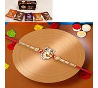 Ghasitaram Gifts Jaiccha Rakhis for Brother Rakhis Online - A-2 Ganesha Divine Rakhi with Asorted Bites Box
