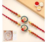 Ghasitaram Gifts Jaiccha Rakhis for Brother Rakhis Online - Set of 2 - Y-221 Peacock Divine Rakhi with 200 GMS of Kaju katli