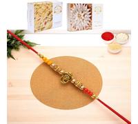 Ghasitaram Gifts Jaiccha Rakhis for Brother Rakhis Online - Y-58 Ganesha Divine Rakhi with 200 GMS of Kaju katli and 200 GMS of Soan Papdi