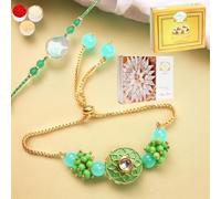 Ghasitaram Gifts Rakhis Online - Rakhi for Brother-T-12 Green Stone Bhaiya Bhabhi Rakhi with 200 GMS of Kaju katli and 200 GMS of Soan Papdi