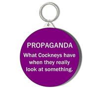 Gift Insanity COCKNEY HUMOUR - PROPAGANDA - WHAT COCKNEYS HAVE WHEN THEY REALLY LOOK AT SOMETHING - WHITE ON PURPLE BACKGROUND - 45mm Small Keyring
