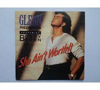 Glenn Medeiros - Medeiros, Glenn She Ain't Worth It 7" London LON265 EX/EX 1990 picture sleeve, featuring Bobby Brown