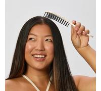 Glov Detangling brush with hook-shaped handle for easy hanging, gentle detangling of hair and ideal styling for all hair types. Perfect for on the go and at home for shiny hair