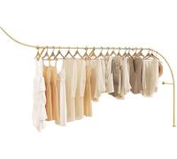 Gold Clothing Racks - Modern Industrial Wall-Mounted Hang Bars Stylish Homes for Closets Fashion Displays and Retail Stores - Perfect for Chic Storage Solutions.