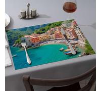 Golden Girls Gifts Colorful Boats Float In Clear Blue Water Near A Picturesque Coastal Town With Vibrant Buildings Dining Place Mats Yellow Placemats Placemats(1PCS)