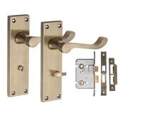 Golden Grace Victorian Scroll Bathroom Handle Set, Antique Brass | Includes spindle, screws and 2.5-inch mortise lock, with a 150mm x 40mm metal backplate for quick, secure fitting.