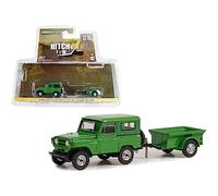 Green Light Collectibles 1:64 scale Diecast Model Car compatible with Nissan Patrol (With 1/4 Ton Cargo Trailer 1972) in Green