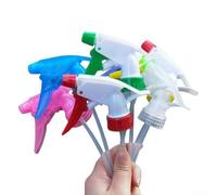 Hand pressure watering can nozzle compatible with different bottle types including plastic bottles featuring customizable water flow for targeted plant care