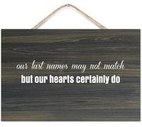 Hanging Wall Sign Wooden, Our Last Names May Not Match But Our Hearts Certainly Do, Rustic Farmhouse Family Wall Plaque for Entryway Door Living Room Bedroom Kitchen Christmas Decor 12x8 inch