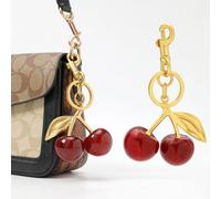 High-Quality Steel Pendant Cherry Keychain Bag Charm Fashion Accessories For Coach Bag Women's Pendant Cute Car Charm Keychain Gold Powder 1