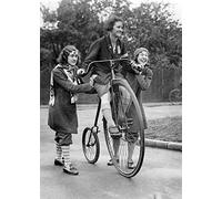 Holy Mackerel a long way down retro black and white photographic card featuring a vintage image of a girl riding a penny farthing bicycle - 12.6 x 17.7cm and blank inside