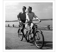 Holy Mackerel couple on a bike retro black and white photographic card featuring a vintage image of a man and woman on their tandem - 15cm square and blank inside